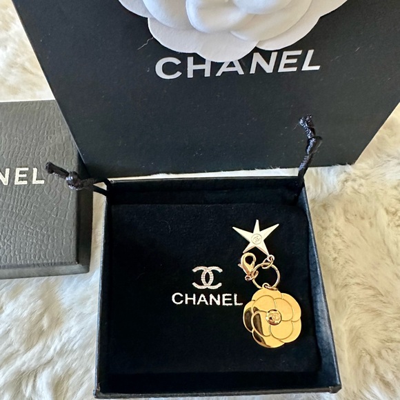 CHANEL Accessories - Brand New CHANEL Gold Camellia Flower Charm Includes Jewelry Bag + Box.